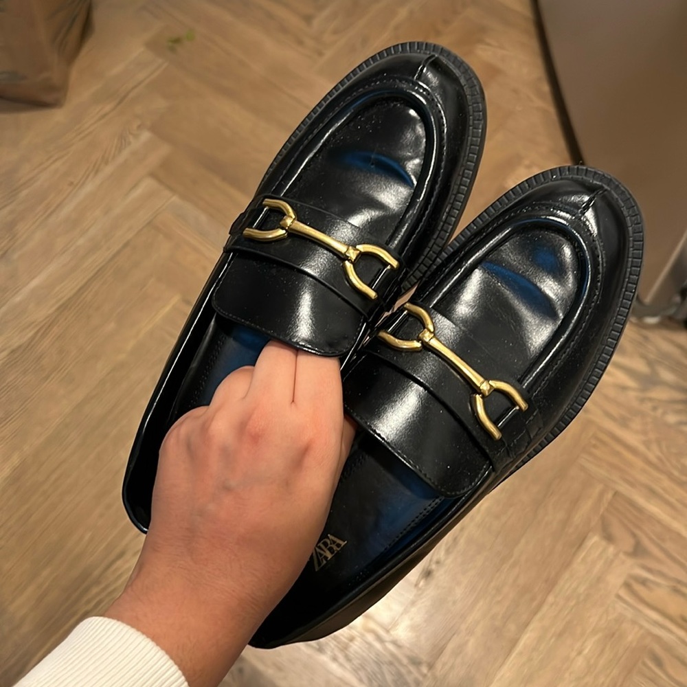 Black leather loafers